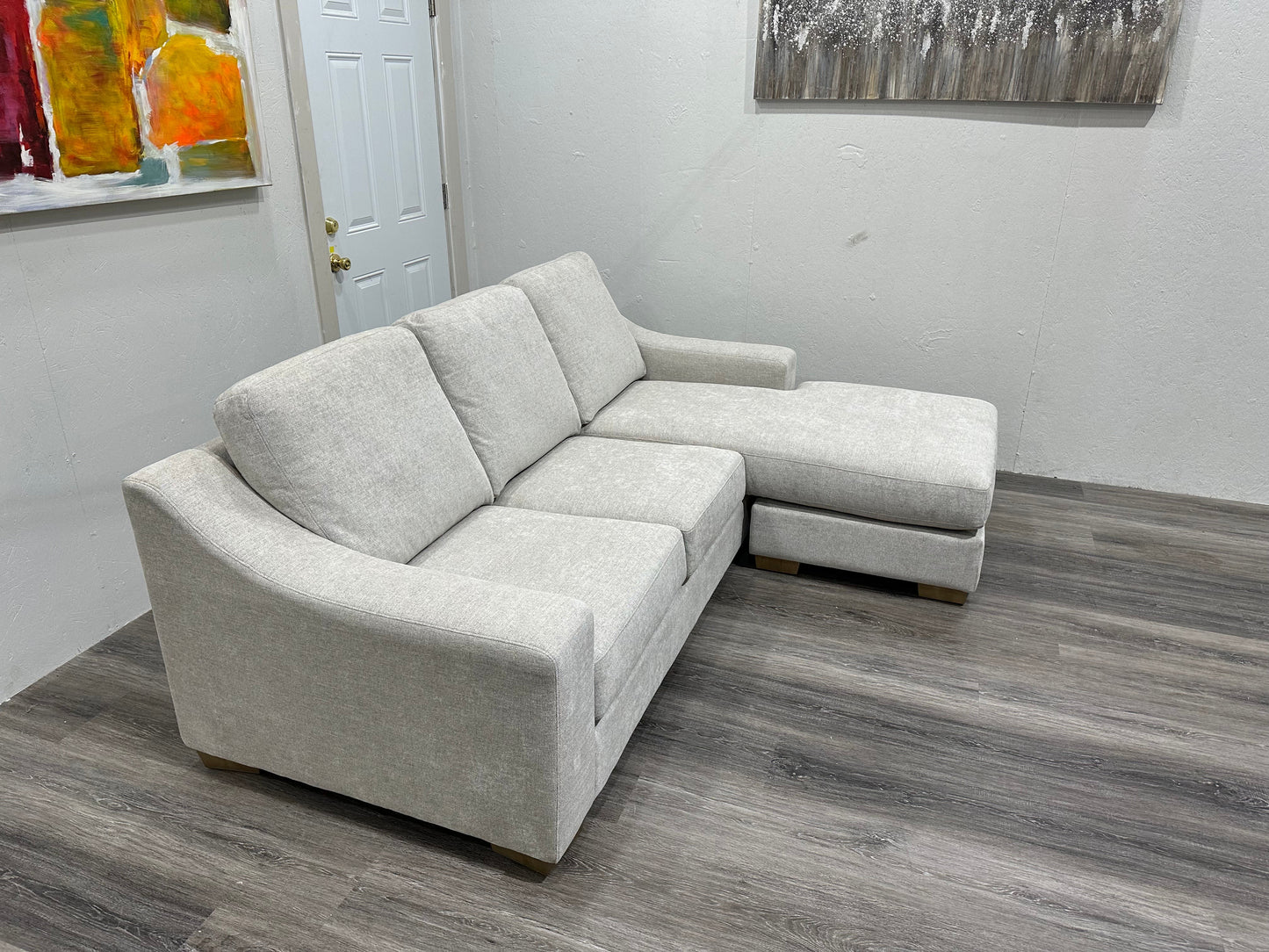 Beige sectional with reversible chase
