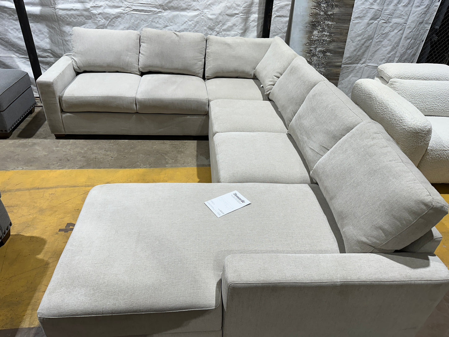 Three-piece beige sectional with storage Chase