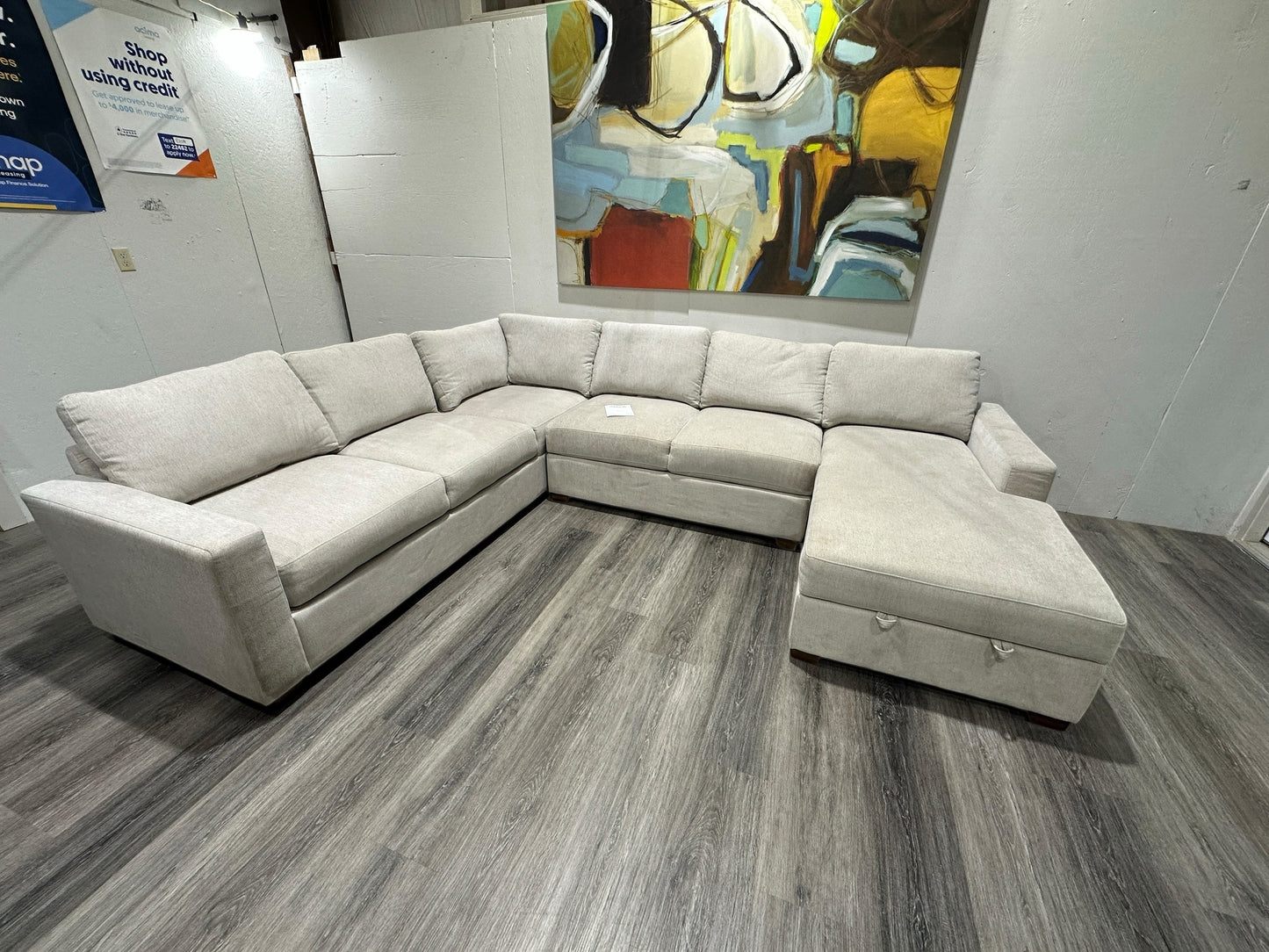 Three-piece beige sectional with storage Chase