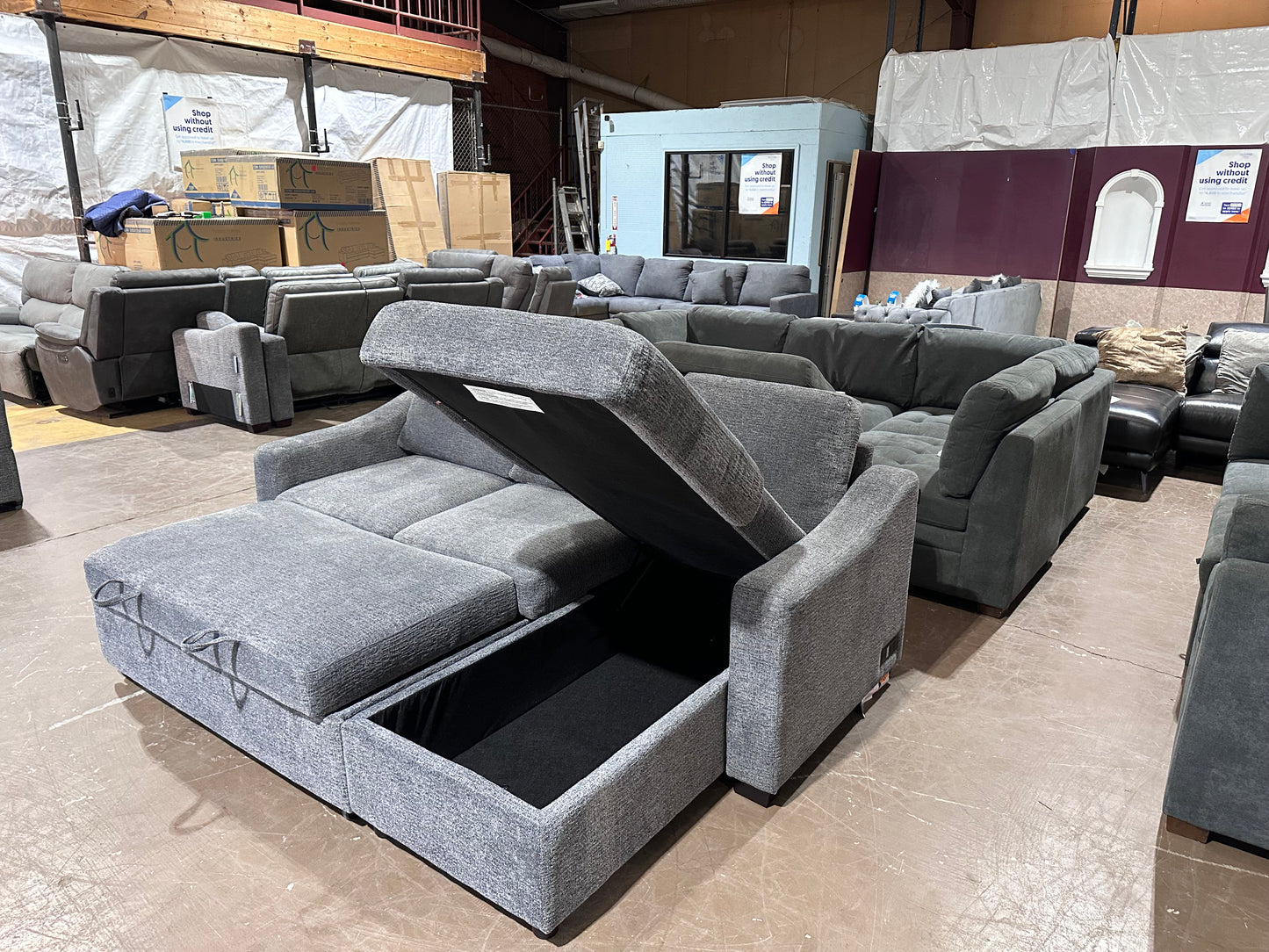 Gray sectional w/ pull out bed