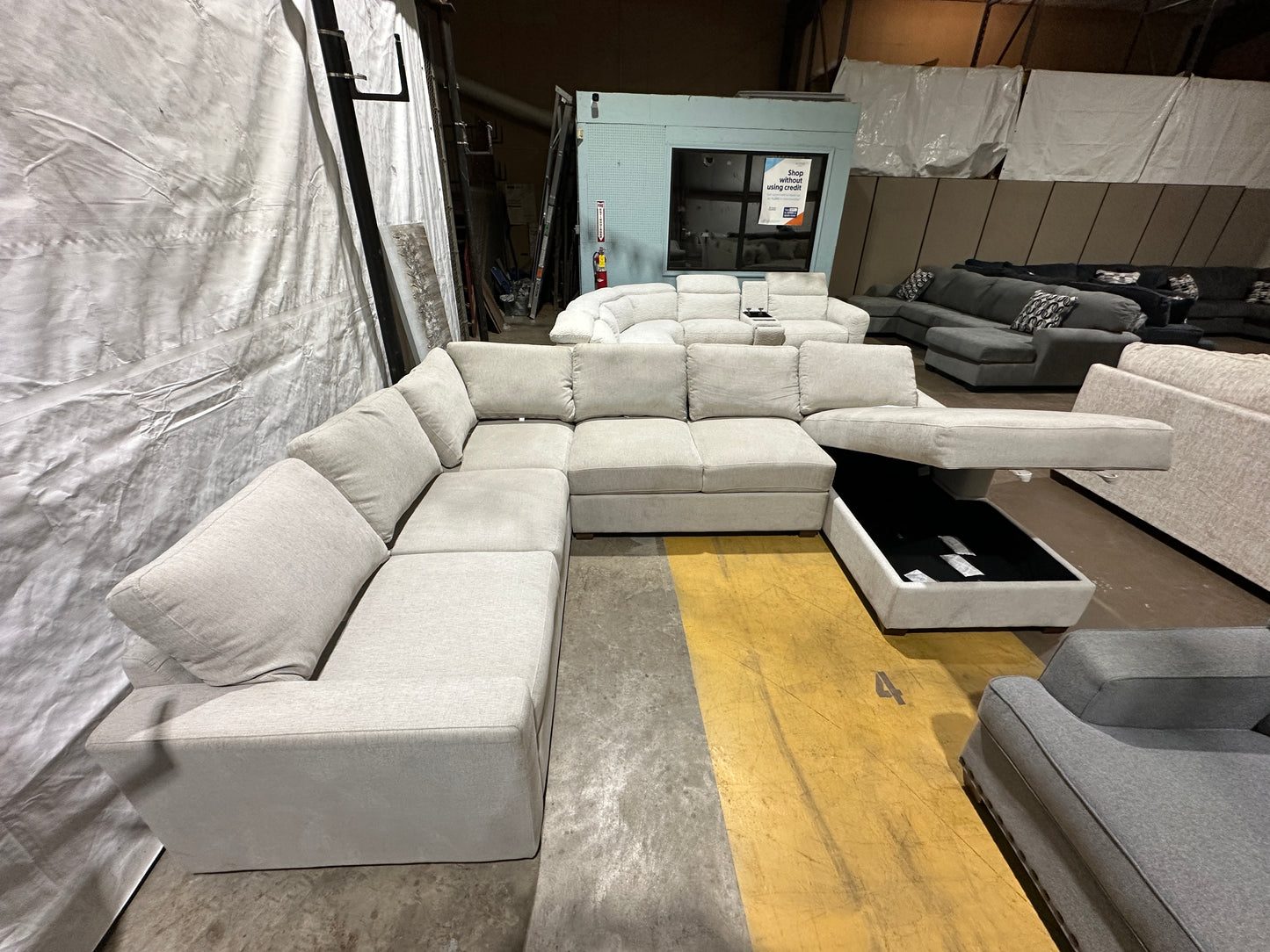 Three-piece beige sectional with storage Chase