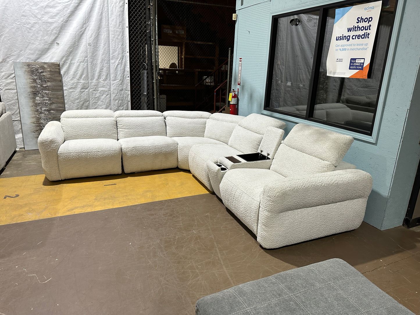 Beige six piece power recliner sectional