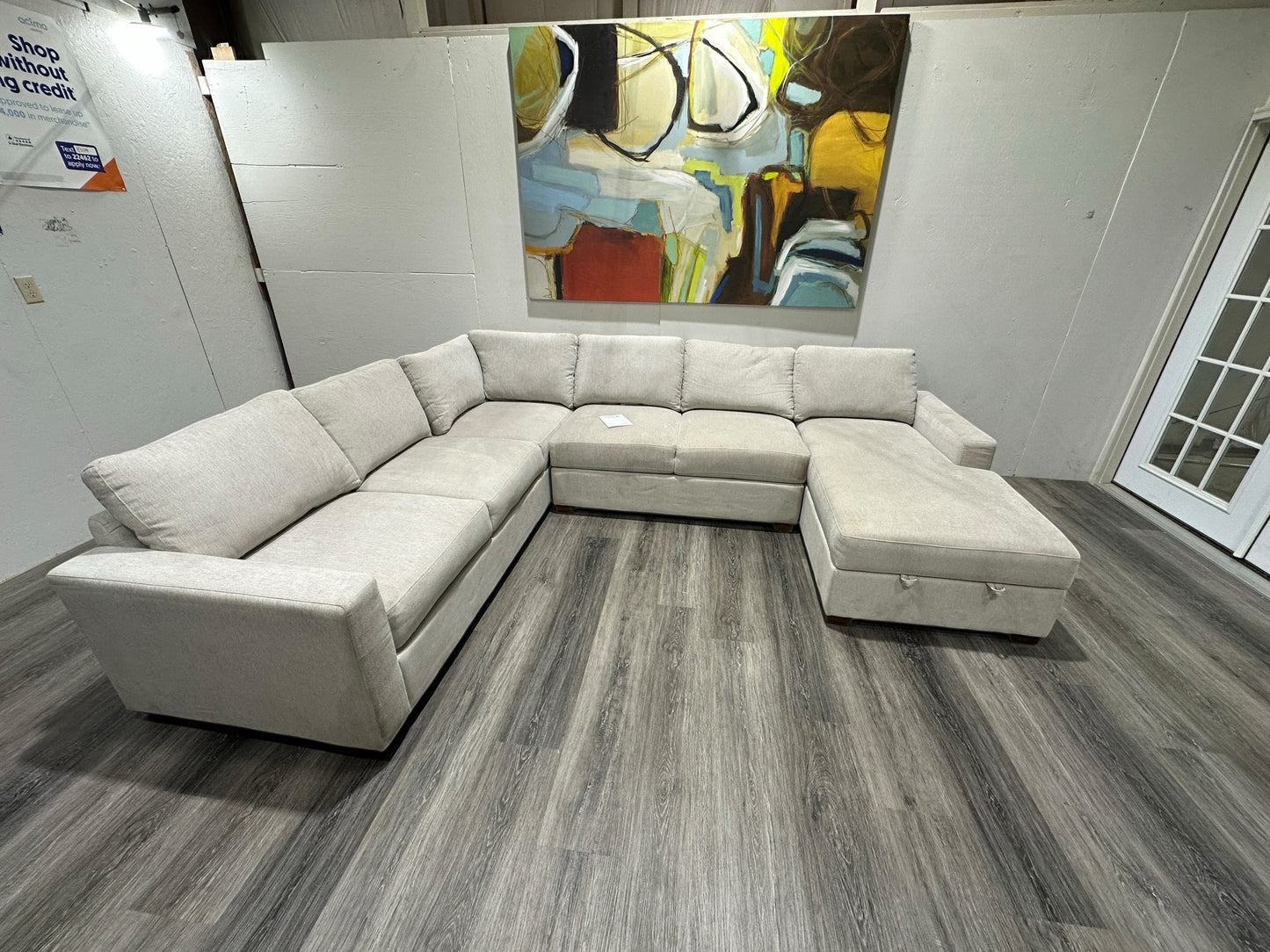 Three-piece beige sectional with storage Chase