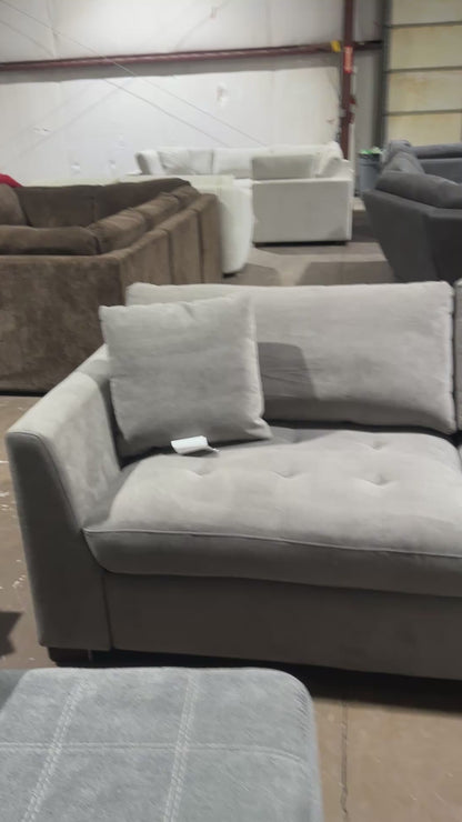 Light grey sofa with power leg rest